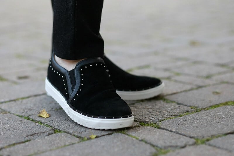 Fashionable slip-on sneakers after 50 - black suede with studs