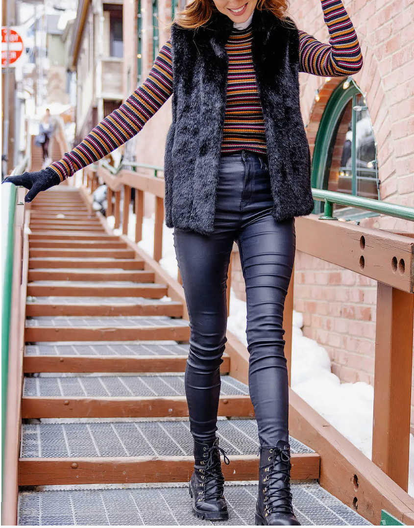 faux fur vest and leather leggings outfit
