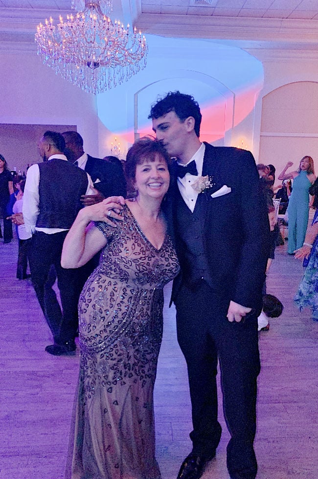 Lynn-Salberg wearing sequin Mother of the groom dress with groom