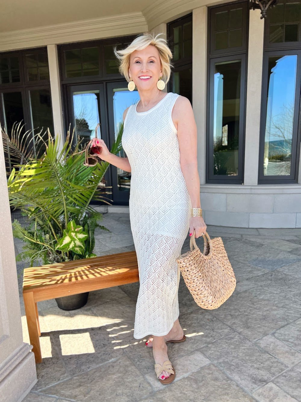 White Crochet Maxi Dress and straw bag Deborah Boland Amazon